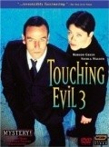Touching Evil pictures.